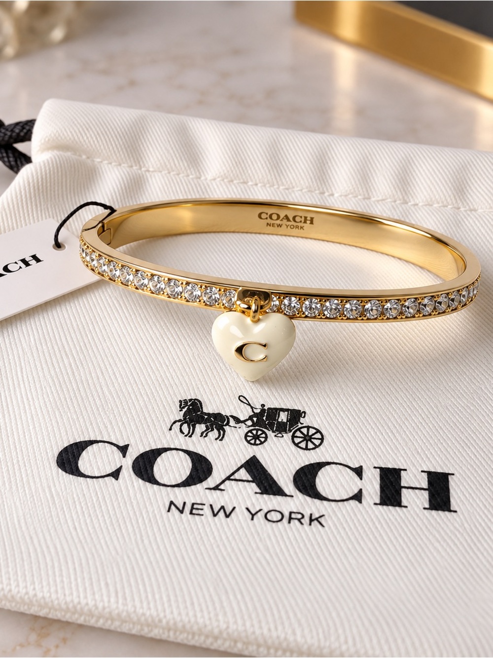 Coach Gold Crystal Bangle with Ivory Heart Charm